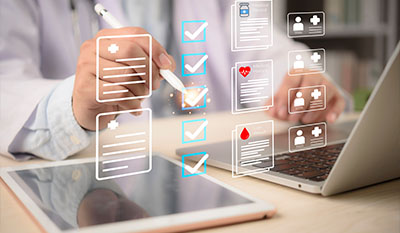 doctor reviewing digital health records on laptop and tablet with checklists and health icons focusing on 6 aspects of patient care